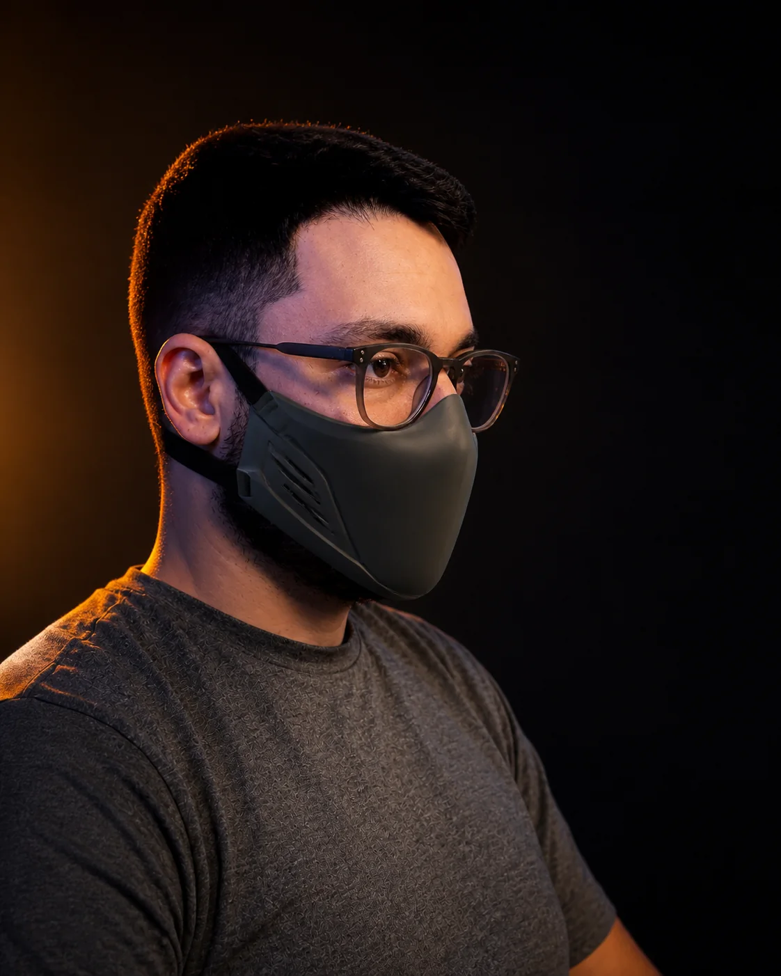 Paulo Real in right-facing profile wearing a graphite security mask